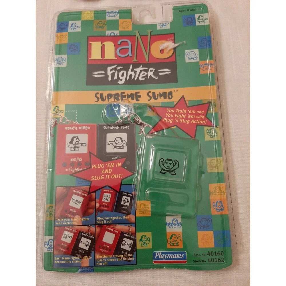 (4 EMPTY PACKAGES)1997 NANO FIGHTER SUPREME SUMO PLAYMATES MICRO PETS NANO KITTY